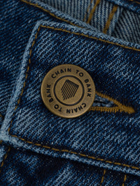 THOUSANDS STANDARD FIT DENIM | DISTRESSED INDIGO WASH