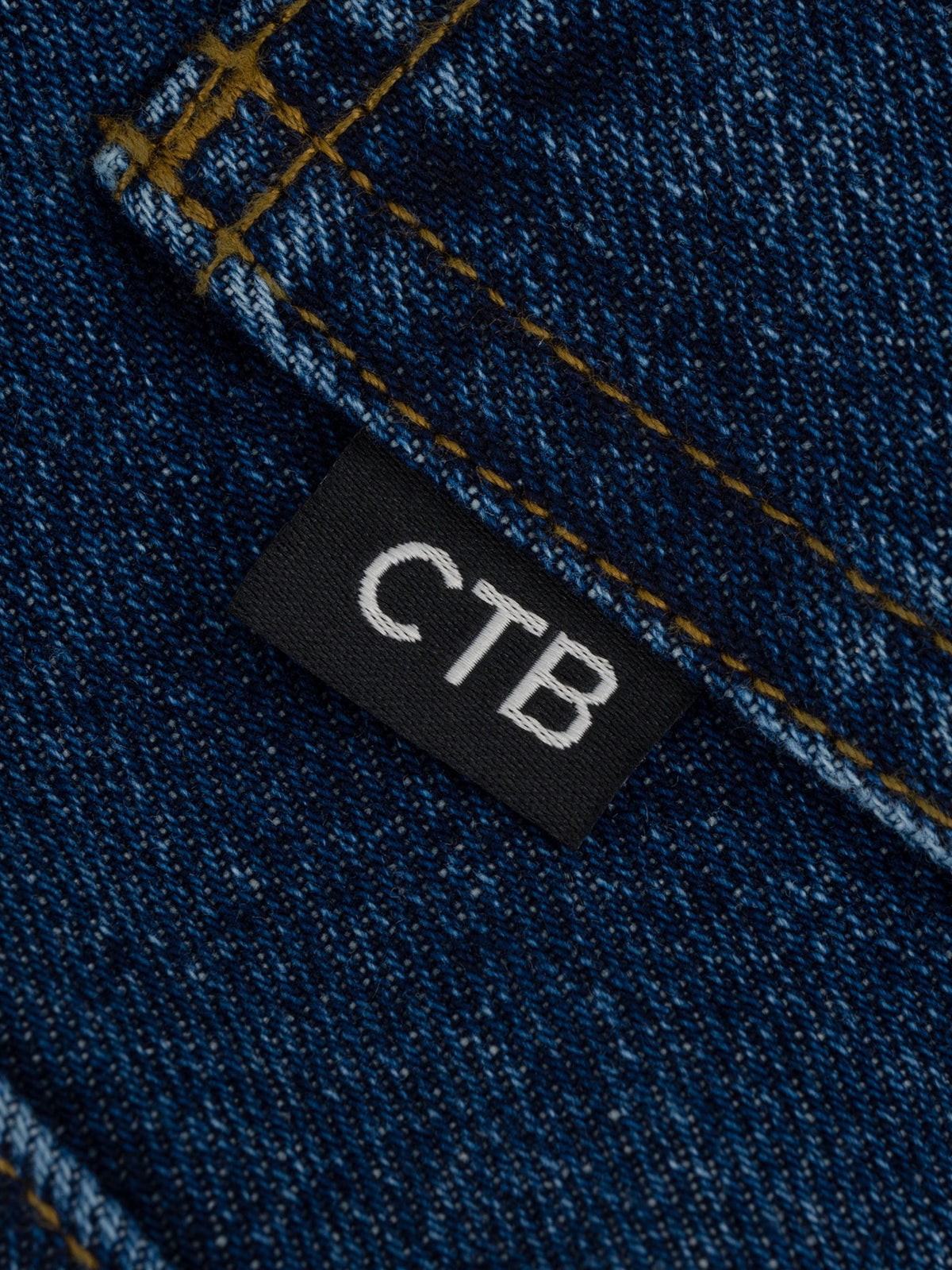 THOUSANDS STANDARD FIT DENIM | DISTRESSED INDIGO WASH