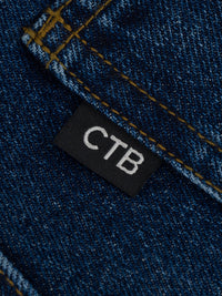 THOUSANDS STANDARD FIT DENIM | DISTRESSED INDIGO WASH